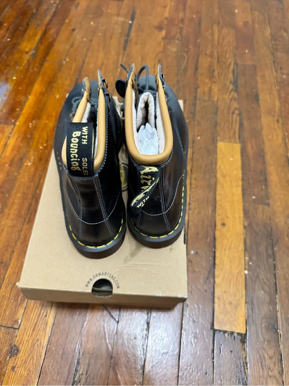 Dr. Martens Black Leather Lace-Up Boots with Yellow Stitching